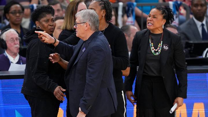 Apr 3, 2026; Phoenix, AZ, USA; UConn Huskies head coach Geno Auriemma and South Carolina Gamecocks head coach Dawn Staley argue at the end of a semifinal of the Final Four of the women's 2026 NCAA Tournament at Mortgage Matchup Center. Mandatory Credit: Joe Camporeale-Imagn Images