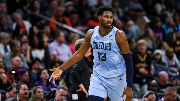 Dec 31, 2024; Phoenix, Arizona, USA; Memphis Grizzlies forward-center Jaren Jackson Jr. (13) celebrates a three point shot he made during the fourth quarter of the game against the Phoenix Suns at Footprint Center. Mandatory Credit: Aryanna Frank-Imagn Images Dec 31, 2024; Phoenix, Arizona, USA; Memphis Grizzlies forward-center Jaren Jackson Jr. (13) celebrates a three point shot he made during the fourth quarter of the game against the Phoenix Suns at Footprint Center. Mandatory Credit: Aryanna Frank-Imagn Images