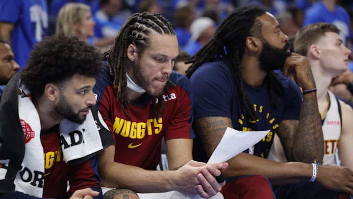 May 18, 2025; Oklahoma City, Oklahoma, USA; Denver Nuggets forward Aaron Gordon (32) looks over stats in the fourth quarter against the Denver Nuggets of game seven of the second round for the 2025 NBA Playoffs at Paycom Center.