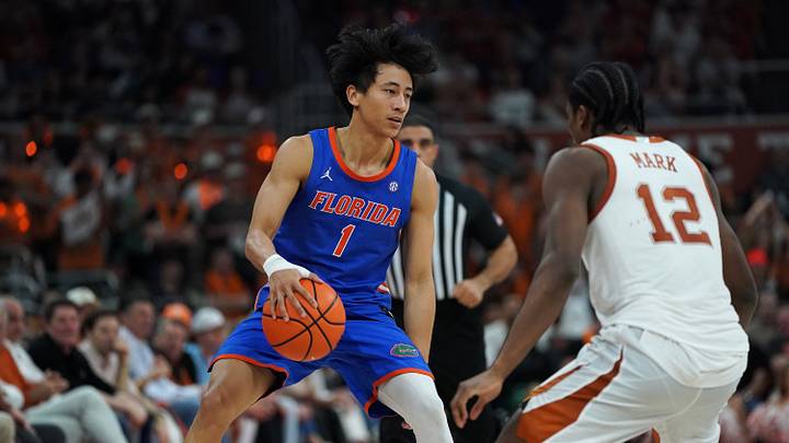 Feb 25, 2026; Austin, Texas, USA; Florida Gators guard Xaivian Lee (1) dribbles against Texas Longhorns guard Tramon Mark (12) during the second half at Moody Center. Feb 25, 2026; Austin, Texas, USA; Florida Gators guard Xaivian Lee (1) dribbles against Texas Longhorns guard Tramon Mark (12) during the second half at Moody Center.