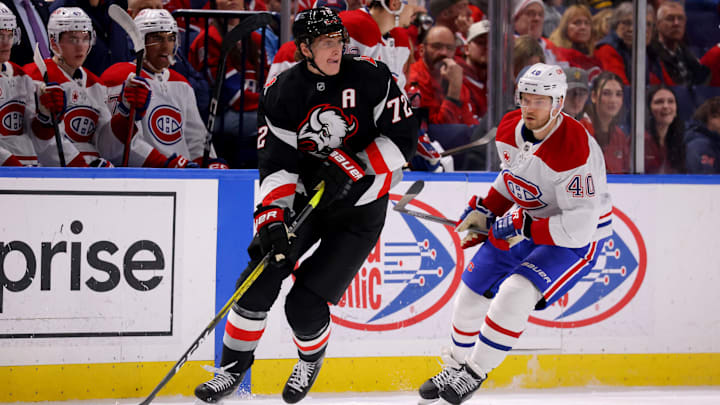 Mar 1, 2025; Buffalo, New York, USA;  Buffalo Sabres center Tage Thompson (72) controls the puck as Montreal Canadiens right wing Joel Armia (40) defends during the first period at KeyBank Center. Mandatory Credit: Timothy T. Ludwig-Imagn Images