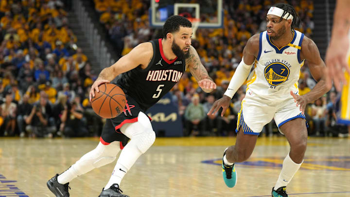 Apr 26, 2025; San Francisco, California, USA; Houston Rockets guard Fred VanVleet (5) dribbles against Golden State Warriors guard Buddy Hield (7) during the third quarter of game three of first round for the 2024 NBA Playoffs at Chase Center. Mandatory Credit: Darren Yamashita-Imagn Images