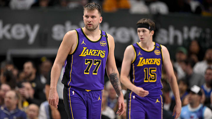 Apr 9, 2025; Dallas, Texas, USA; Los Angeles Lakers guard Luka Doncic (77) and guard Austin Reaves (15) during the game between the Dallas Mavericks and the Los Angeles Lakers at American Airlines Center. Mandatory Credit: Jerome Miron-Imagn Images
