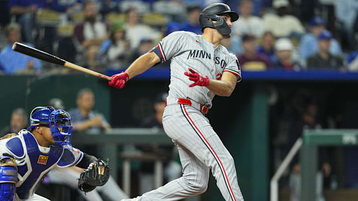Apr 9, 2025; Kansas City, Missouri, USA; Minnesota Twins designated hitter Matt Wallner (38) hits a home run during the eighth inning against the Kansas City Royals at Kauffman Stadium.