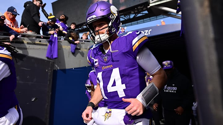 Nov 24, 2024; Chicago, Illinois, USA; Minnesota Vikings quarterback Sam Darnold (14) enters the field before the game against the Chicago Bears at Soldier Field.