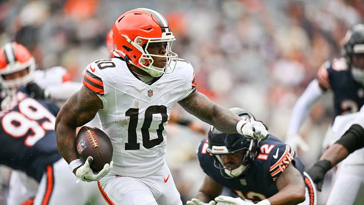 Aug 15, 2026; Chicago, Illinois, USA; Cleveland Browns running back Quinshon Judkins (10) runs the ball against Chicago Bears linebacker Devin Bush (12) during the first half at Soldier Field. 