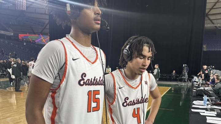 Kayden Greene (4) , shown with Yabi Aklog, is a two-sport standout for Eastside Catholic High.