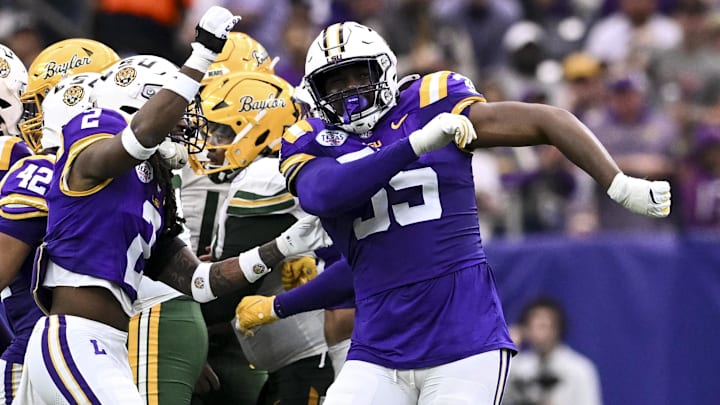 Dec 31, 2024; Houston, TX, USA; LSU Tigers defensive end Sai'vion Jones (35) rects during the first half against the Baylor Bears at NRG Stadium. Mandatory Credit: Maria Lysaker-Imagn Images 