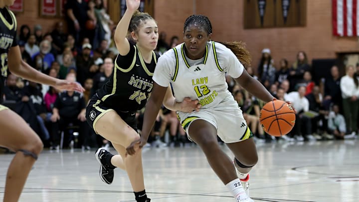 Ontario Christian freshman Tati Griffin drives hard to the basket en route to two of her 14 points, helping the Knights beat Archbishop Mitty 61-44 in the premier game of the 4th Sabrina Ionescu Classic in Concord 1/4/2025. Griffin injured her right knee in a summer event Sunday July 6 and the girls basketball community holds their breath waiting for MRI results to return early this week.