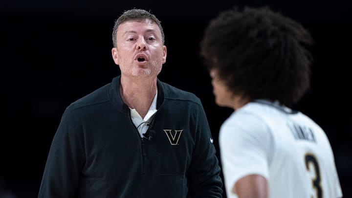 Vanderbilt head coach Mark Byington talks with Vanderbilt guard Tyler Tanner (3) during the first half of their exhibition game against Virginia at Memorial Gym in Nashville, Tenn., Thursday, Oct. 16, 2025.