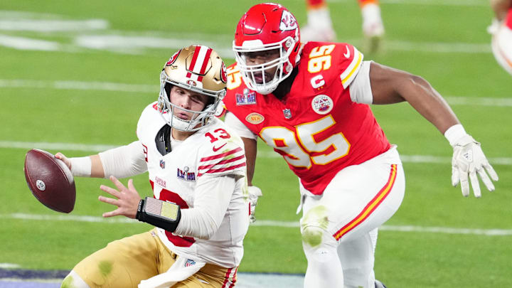 Feb 11, 2024; Paradise, Nevada, USA; San Francisco 49ers quarterback Brock Purdy (13) is pressured by Kansas City Chiefs defensive tackle Chris Jones (95) in the second half in Super Bowl LVIII at Allegiant Stadium. Mandatory Credit: Stephen R. Sylvanie-USA TODAY Sports