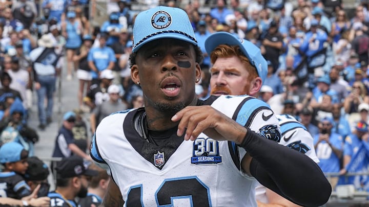 Sep 15, 2024; Charlotte, North Carolina, USA;  Carolina Panthers cornerback Troy Hill (13) takes the field against the Los Angeles Chargers during the first quarter at Bank of America Stadium. Mandatory Credit: Jim Dedmon-Imagn Images