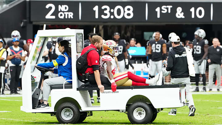 Aug 16, 2025; Paradise, Nevada, USA; San Francisco 49ers cornerback Jakob Robinson (49) is carted off the field after sustaining an injury against the Las Vegas Raiders during the second quarter at Allegiant Stadium. Mandatory Credit: Stephen R. Sylvanie-Imagn Images