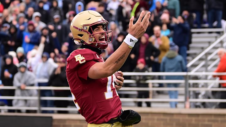 Nov 23, 2024; Chestnut Hill, Massachusetts, USA; Boston College Eagles quarterback Grayson James (14) reacts to his touchdown against the North Carolina Tar Heels during the first half at Alumni Stadium. Mandatory Credit: Eric Canha-Imagn Images