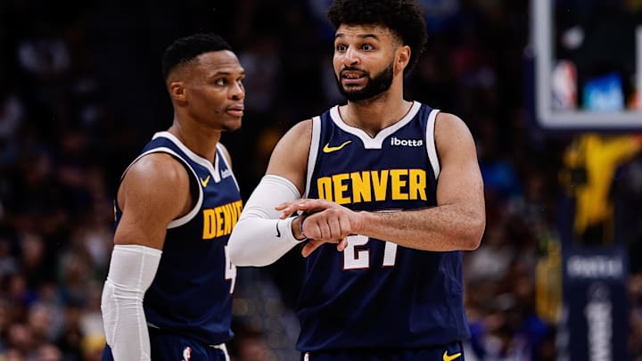 Oct 26, 2024; Denver, Colorado, USA; Denver Nuggets guard Jamal Murray (27) gestures ahead of guard Russell Westbrook (4) in the fourth quarter against the Los Angeles Clippers at Ball Arena. Mandatory Credit: Isaiah J. Downing-Imagn Images