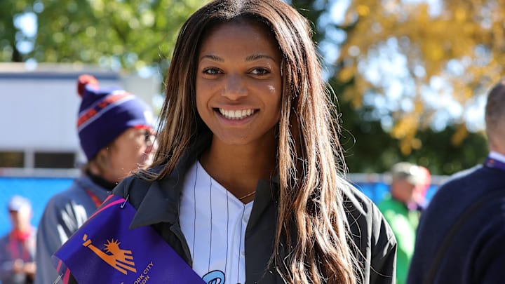 Five-Time Olympic Medalist Gabby Thomas as 2024 New York City Marathon Grand Marshal celebrates after racing through the streets of New York City. Five-Time Olympic Medalist Gabby Thomas as 2024 New York City Marathon Grand Marshal celebrates after racing through the streets of New York City.