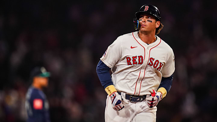 Apr 22, 2025; Boston, Massachusetts, USA; Boston Red Sox first base Triston Casas (36) hits a three run home run against the Seattle Mariners in the seventh inning at Fenway Park. Mandatory Credit: David Butler II-Imagn Images