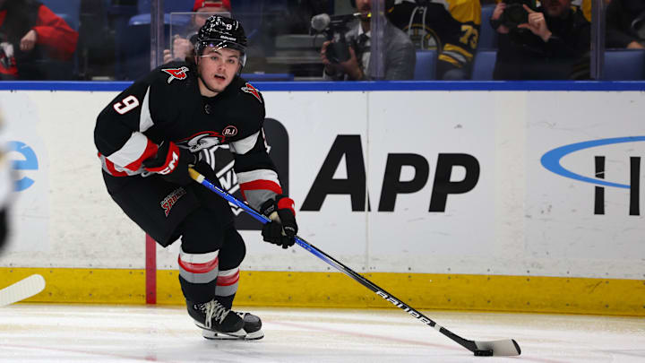 Dec 27, 2023; Buffalo, New York, USA;  Buffalo Sabres left wing Zach Benson (9) looks to make a pass