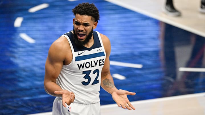 Minnesota Timberwolves center Karl-Anthony Towns reacts after being called for a foul during the third quarter against the Dallas Mavericks in game four of the Western Conference finals for the 2024 NBA playoffs at American Airlines Center.