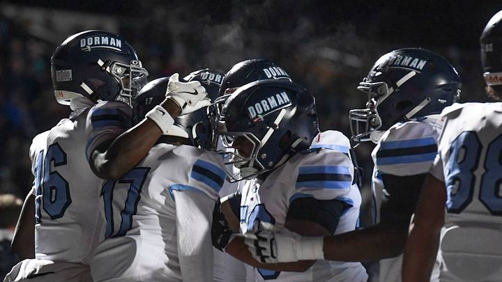 Dorman Cavaliers Tre'gan Mickler (17) celebrates with teammates after scoring Friday, Nov. 28, 2025, during the SCHSL semi state football game against the Dutch Fork Silver Foxes at Dutch Fork High School in Irmo, South Carolina. Dorman Cavaliers Tre'gan Mickler (17) celebrates with teammates after scoring Friday, Nov. 28, 2025, during the SCHSL semi state football game against the Dutch Fork Silver Foxes at Dutch Fork High School in Irmo, South Carolina.