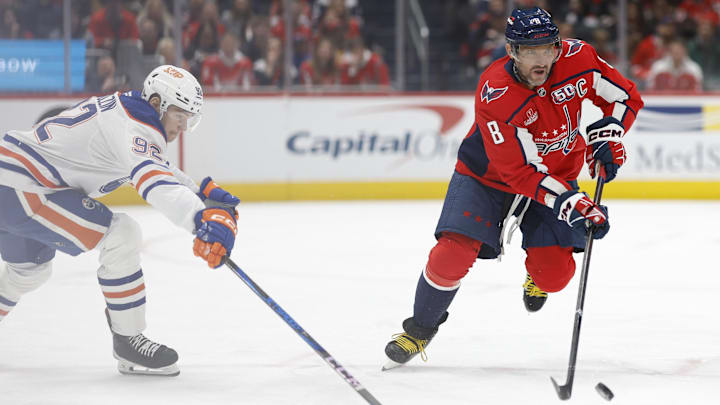 Feb 23, 2025; Washington, District of Columbia, USA; Washington Capitals left wing Alex Ovechkin (8) skates with the puck as Edmonton Oilers right wing Vasily Podkolzin (92) defends in the second period at Capital One Arena. Mandatory Credit: Geoff Burke-Imagn Images Feb 23, 2025; Washington, District of Columbia, USA; Washington Capitals left wing Alex Ovechkin (8) skates with the puck as Edmonton Oilers right wing Vasily Podkolzin (92) defends in the second period at Capital One Arena. Mandatory Credit: Geoff Burke-Imagn Images