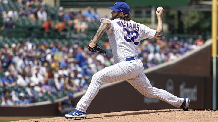 Jul 25, 2021; Chicago, Illinois, USA; Chicago Cubs starting pitcher Trevor Williams (32) delivers a pitch against the Arizona Diamondbacks during the first inning at Wrigley Field.