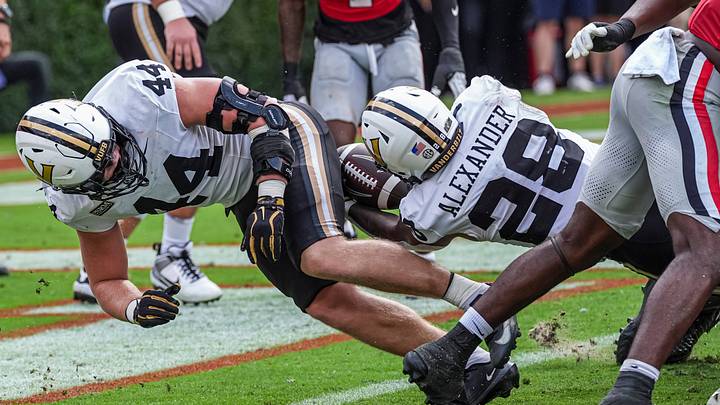 Oct 3, 2026; Athens, Georgia, USA; Vanderbilt Commodores running back Sedrick Alexander (28) scores a touchdown behind fullback Gabe Fisher (44) against the Georgia Bulldogs at Sanford Stadium. Mandatory Credit: Dale Zanine-Imagn Images Oct 3, 2026; Athens, Georgia, USA; Vanderbilt Commodores running back Sedrick Alexander (28) scores a touchdown behind fullback Gabe Fisher (44) against the Georgia Bulldogs at Sanford Stadium. Mandatory Credit: Dale Zanine-Imagn Images
