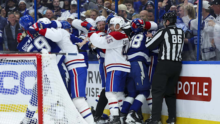 Apr 21, 2026; Tampa, Florida, USA; the Tampa Bay Lightning fight with the Montreal Canadiens in the first period during game two of the first round of the 2026 Stanley Cup Playoffs at Benchmark International Arena. Mandatory Credit: Nathan Ray Seebeck-Imagn Images