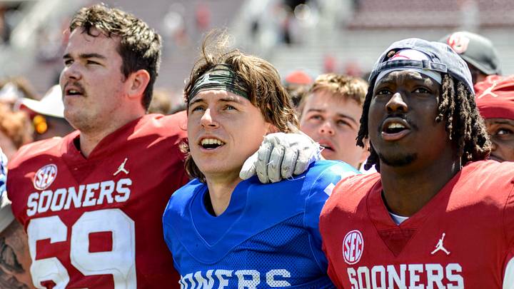 Oklahoma quarterback John Mateer sings OU's alma mater after the 2026 Spring Game alongside linebacker Kip Lewis and center Jake Maikkula. Oklahoma quarterback John Mateer sings OU's alma mater after the 2026 Spring Game alongside linebacker Kip Lewis and center Jake Maikkula.