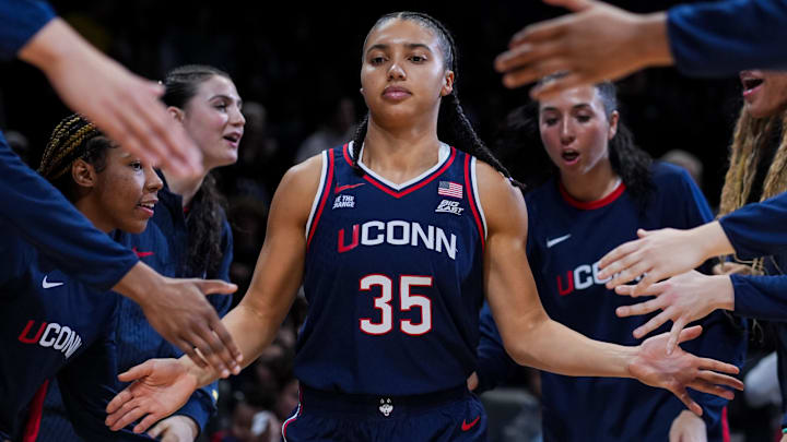 Nov 30, 2025; Cincinnati, Ohio, USA;  UConn Huskies guard Azzi Fudd (35) takes the court during player introductions before the game against the Xavier Musketeers at the Cintas Center. Mandatory Credit: Aaron Doster-Imagn Images