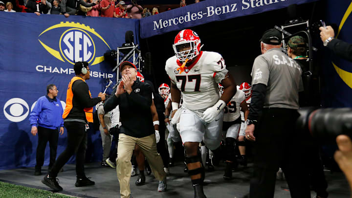 Georgia coach Kirby Smart leads his team onto the field before the start of the SEC Championship game against Alabama at Mercedes-Benz Stadium in Atlanta, on Saturday, Dec. 2, 2023.