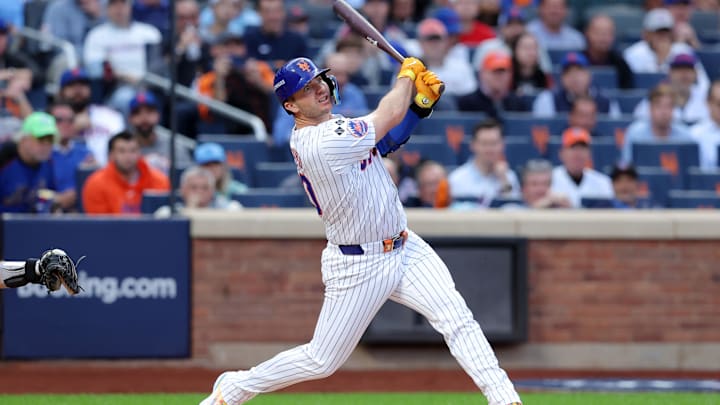 Oct 8, 2024; New York City, New York, USA; New York Mets first baseman Pete Alonso (20) hits a solo home run in the second inning against the Philadelphia Phillies during game three of the NLDS for the 2024 MLB Playoffs at Citi Field. Mandatory Credit: Brad Penner-Imagn Images
