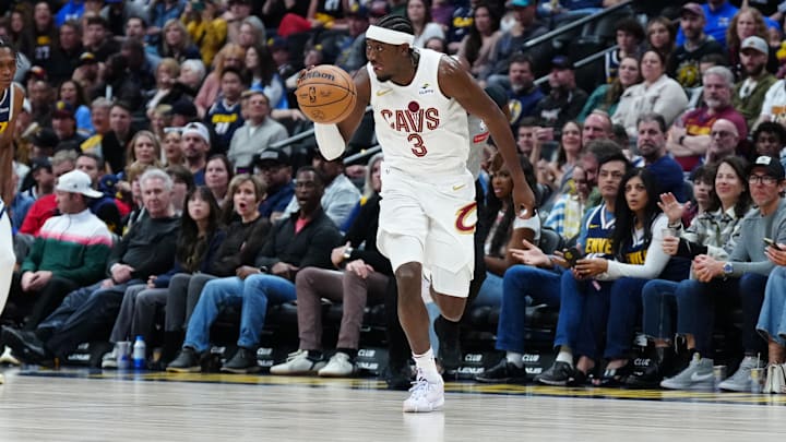 Mar 31, 2024; Denver, Colorado, USA; Cleveland Cavaliers guard Caris LeVert (3) drives to the net after a steal in the second half against the Denver Nuggets at Ball Arena. Mandatory Credit: Ron Chenoy-Imagn Images