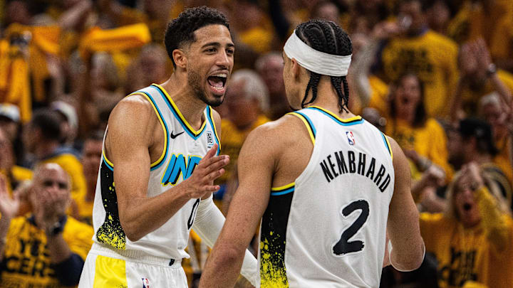 Apr 29, 2025; Indianapolis, Indiana, USA; Indiana Pacers guard Andrew Nembhard (2) celebrates a made basket with  guard Tyrese Haliburton (0) during game five of the first round for the 2024 NBA Playoffs against the Milwaukee Bucks  at Gainbridge Fieldhouse. Mandatory Credit: Trevor Ruszkowski-Imagn Images