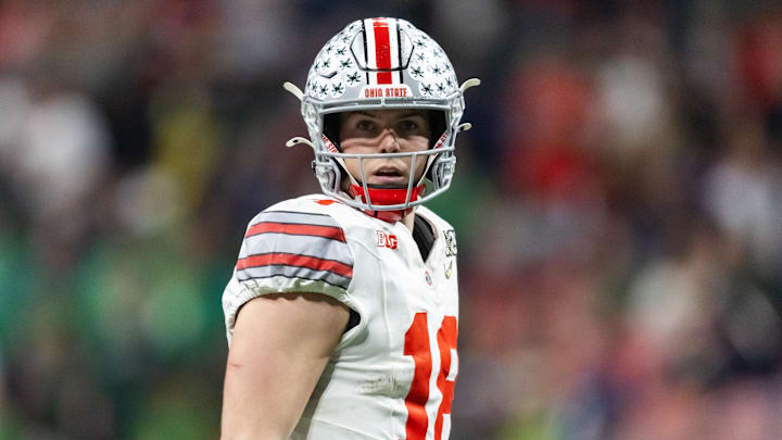 Jan 20, 2025; Atlanta, GA, USA; Ohio State Buckeyes quarterback Will Howard (18) against the Notre Dame Fighting Irish during the CFP National Championship college football game at Mercedes-Benz Stadium. Jan 20, 2025; Atlanta, GA, USA; Ohio State Buckeyes quarterback Will Howard (18) against the Notre Dame Fighting Irish during the CFP National Championship college football game at Mercedes-Benz Stadium.