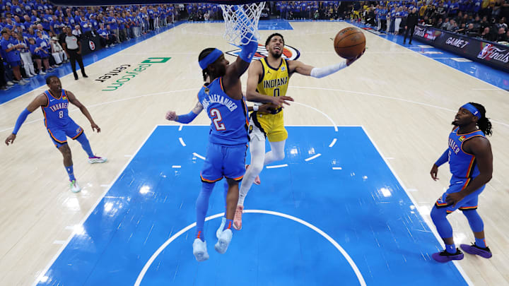 Jun 22, 2025; Oklahoma City, Oklahoma, USA; Indiana Pacers guard Tyrese Haliburton (0) drives to the basket against Oklahoma City Thunder guard Shai Gilgeous-Alexander (2) during game seven of the 2025 NBA Finals at Paycom Center. Mandatory Credit: Matthew Stockman-Pool Photo via Imagn Images Jun 22, 2025; Oklahoma City, Oklahoma, USA; Indiana Pacers guard Tyrese Haliburton (0) drives to the basket against Oklahoma City Thunder guard Shai Gilgeous-Alexander (2) during game seven of the 2025 NBA Finals at Paycom Center. Mandatory Credit: Matthew Stockman-Pool Photo via Imagn Images