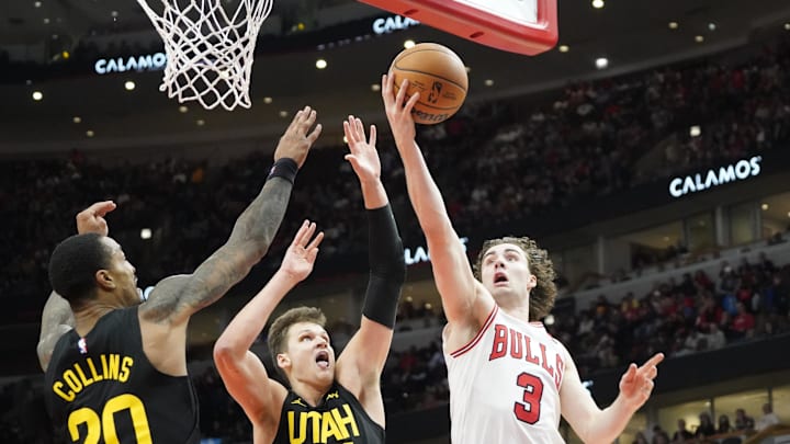 Nov 4, 2024; Chicago, Illinois, USA; Utah Jazz forward John Collins (20)  and center Walker Kessler (24) defend against Chicago Bulls guard Josh Giddey (3)