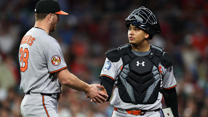 Aug 18, 2025; Boston, Massachusetts, USA; Baltimore Orioles starting pitcher Trevor Rogers (28) and Baltimore Orioles catcher Samuel Basallo (29) react during the seventh inning against the Boston Red Sox at Fenway Park. Mandatory Credit: Paul Rutherford-Imagn Images