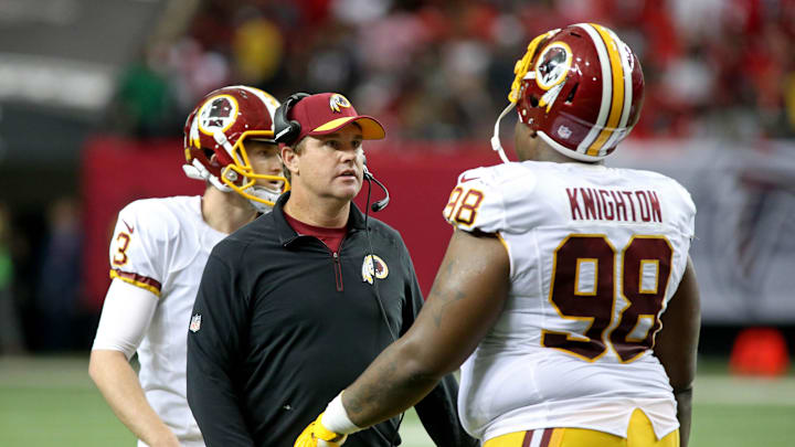 Oct 11, 2015; Atlanta, GA, USA; Washington Redskins head coach Jay Gruden talks with defensive tackle Terrance Knighton (98) in the fourth quarter of their game against the Atlanta Falcons at the Georgia Dome. The Falcons won 25-19 in overtime. Mandatory Credit: Jason Getz-Imagn Images