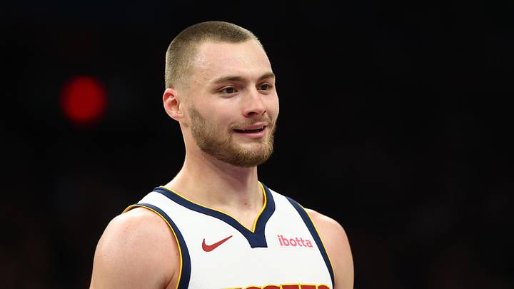 Mar 24, 2026; Phoenix, Arizona, USA; Denver Nuggets guard Christian Braun (0) against the Phoenix Suns at Mortgage Matchup Center. Mandatory Credit: Mark J. Rebilas-Imagn Images