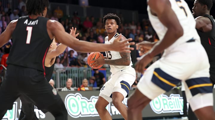Nov 27, 2024; Paradise Island, Bahamas, BHS; West Virginia Mountaineers forward Amani Hansberry (13) looks to pass against the Gonzaga Bulldogs during the first half at the Atlantis Resort. 