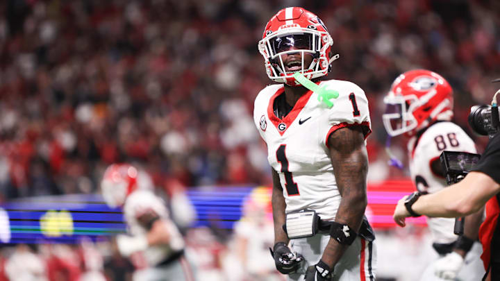 Dec 6, 2025; Atlanta, GA, USA; Georgia Bulldogs wide receiver Zachariah Branch (1) celebrates after scoring a touchdown during the fourth quarter against the Alabama Crimson Tide during the 2025 SEC Championship game at Mercedes-Benz Stadium. Mandatory Credit: Brett Davis-Imagn Images