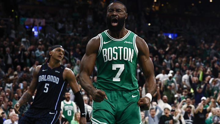 Apr 23, 2025; Boston, Massachusetts, USA; Boston Celtics guard Jaylen Brown (7) shouts out after dunking as Orlando Magic forward Paolo Banchero (5) turns away during the second half of game two of the first round of the 2024 NBA Playoffs at TD Garden. Mandatory Credit: Winslow Townson-Imagn Images