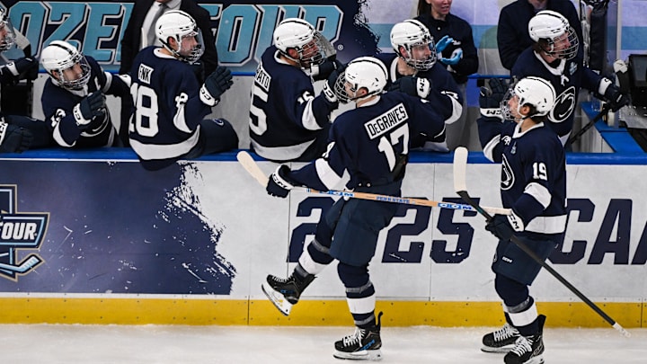 Penn State Nittany Lions men's hockey team celebrating goal