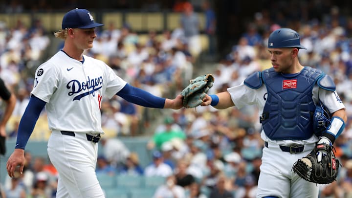Sep 21, 2025; Los Angeles, California, USA;  Los Angeles Dodgers starting pitcher Emmet Sheehan (80) is greeted by catcher Dalton Rushing (68) during the seventh inning against the San Francisco Giants at Dodger Stadium. Mandatory Credit: Kiyoshi Mio-Imagn Images