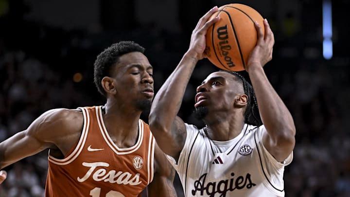 Feb 28, 2026; College Station, Texas, USA;Texas A&M Aggies guard Marcus Hill (0) drives to the basket against Texas Longhorns forward Nic Codie (10) during the second half at Reed Arena. Mandatory Credit: Maria Lysaker-Imagn Images Feb 28, 2026; College Station, Texas, USA;Texas A&M Aggies guard Marcus Hill (0) drives to the basket against Texas Longhorns forward Nic Codie (10) during the second half at Reed Arena. Mandatory Credit: Maria Lysaker-Imagn Images