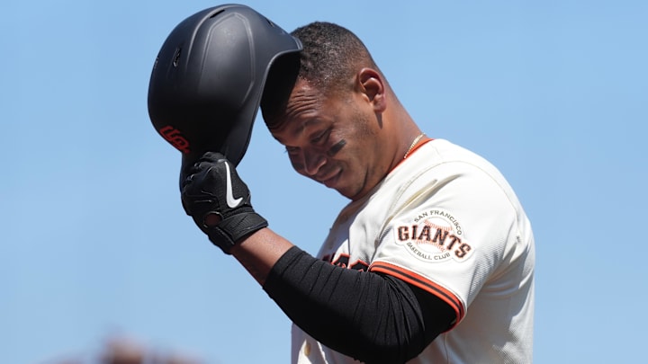 Jul 12, 2025; San Francisco, California, USA; San Francisco Giants designated hitter Rafael Devers (16) walks to the dugout after grounding out against the Los Angeles Dodgers during the sixth inning at Oracle Park