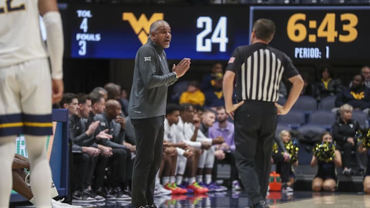 Jan 9, 2024; Morgantown, West Virginia, USA; Kansas State Wildcats head coach Jerome Tang argues a call during the first half against the West Virginia Mountaineers at WVU Coliseum. Mandatory Credit: Ben Queen-Imagn Images