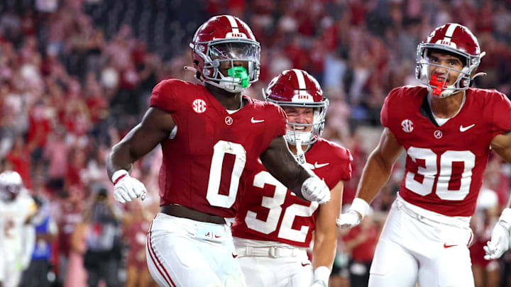 Sep 6, 2025; Tuscaloosa, Alabama, USA; Alabama Crimson Tide running back AK Dear (0) celebrates his touchdown with teammates wide receiver Jay Loper Jr. (32) and wide receiver Derek Meadows (30) during the fourth quarter at Saban Field at Bryant-Denny Stadium. Mandatory Credit: David Leong-Imagn Images
