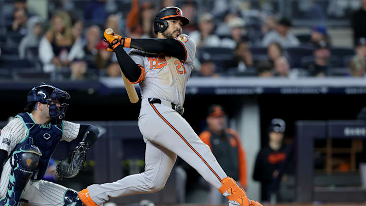 Sep 25, 2024; Bronx, New York, USA; Baltimore Orioles right fielder Anthony Santander (25) follows through on an RBI double against the New York Yankees during the fourth inning at Yankee Stadium. Mandatory Credit: Brad Penner-Imagn Images